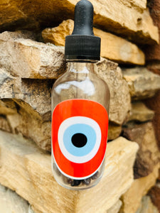 Red Evil Eye Oil infused with Black Obsidian, Therapeutic Essential Oils & Reiki blessed by Queen